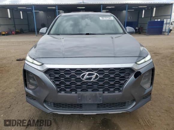 ✅ 2019 Hyundai Santa Fe SE • VIN: 5NMS2CAD8KH089843 • Лот: 80187565. Опубликован ранее на Copart с пробегом 121 064 миль. Бесплатный доступ к архиву аукционных продаж из США и подробный отчёт об истории автомобиля на DreamBid. Изображение 5.