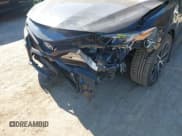 ✅ 2022 Toyota Camry Hybrid SE • VIN: 4T1S31AK2NU594799 • Lot: 43542459. Listed on IAAI with 79,867 mi. Free auction sales archive from the USA and detailed vehicle history report at DreamBid. Image 6.