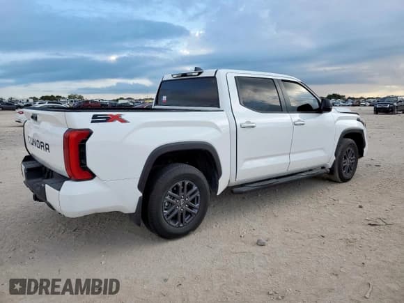 ✅ 2025 Toyota Tundra SR • VIN: 5TFLA5ABXSX048560 • Lot: 80626935. Listed on Copart with 7,934 mi. Free auction sales archive from the USA and detailed vehicle history report at DreamBid. Image 3.