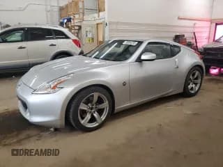 ✅ 2009 Nissan 370Z Touring • VIN: JN1AZ44E59M405514 • Lot: 70064235. Listed on Copart with 198,510 mi. Free auction sales archive from the USA and detailed vehicle history report at DreamBid. Image 1.