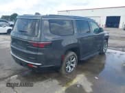 ✅ 2023 Jeep Wagoneer Series II • VIN: 1C4SJVBPXPS515874 • Lot: 42728894. Listed on IAAI with 56,284 mi. Free auction sales archive from the USA and detailed vehicle history report at DreamBid. Image 4.