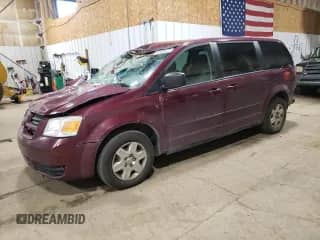 2009 Dodge Grand Caravan SE with VIN 2D8HN44E29R529603, listed as a Copart auction lot 69486075 with 231,156 mi miles and Salvage title. Bid and sale history available at DreamBid. Image 1.