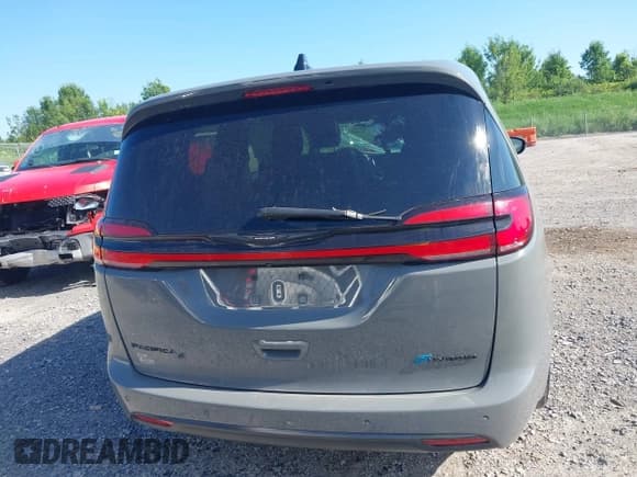 ✅ 2023 Chrysler Pacifica Hybrid Limited • VIN: 2C4RC1S71PR569860 • Lot: 42600542. Listed on IAAI with 55,878 mi. Free auction sales archive from the USA and detailed vehicle history report at DreamBid. Image 16.