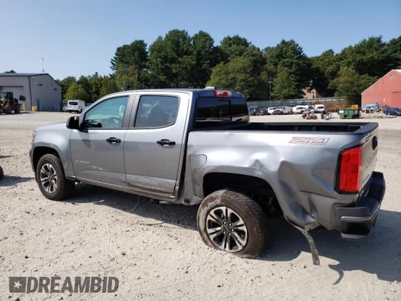 ✅ 2021 Chevrolet Colorado 4WD Z71 • VIN: 1GCGTDEN8M1241774 • Лот: 71227364. Опубликован ранее на Copart с пробегом 49 518 миль. Бесплатный доступ к архиву аукционных продаж из США и подробный отчёт об истории автомобиля на DreamBid. Изображение 2.