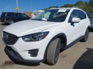✅ 2016 Mazda CX-5 Grand Touring • VIN: JM3KE4DY8G0908425 • Lot: 43350691. Wystawiony na IAAI z przebiegiem 144 684 mil. Bezpłatny archiwum sprzedaży aukcyjnych z USA i szczegółowy raport historii pojazdu na DreamBid. Zdjęcie 17.