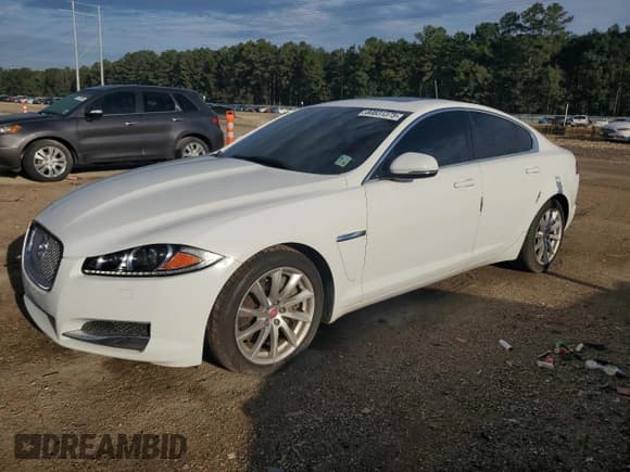 ✅ 2014 Jaguar XF T • VIN: SAJWA0ES0EPU30628 • Lot: 80831375. Listed on Copart with 128,057 mi. Free auction sales archive from the USA and detailed vehicle history report at DreamBid. Image 1.