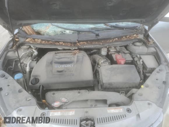 ✅ 2012 Suzuki Kizashi SE • VIN: JS2RE9A37C6101257 • Лот: 41341545. Опубликован ранее на Copart с пробегом Не указан. Бесплатный доступ к архиву аукционных продаж из США и подробный отчёт об истории автомобиля на DreamBid. Изображение 11.