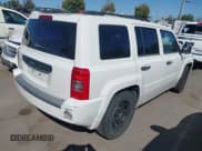 ✅ 2010 Jeep Patriot Sport • VIN: 1J4NT2GA3AD639727 • Lot: 42517340. Listed on IAAI with 215,101 mi. Free auction sales archive from the USA and detailed vehicle history report at DreamBid. Image 4.