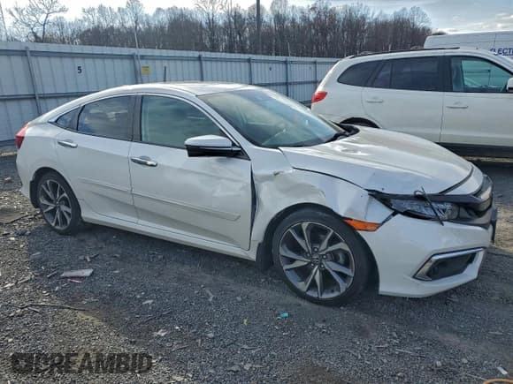 ✅ 2019 Honda Civic Touring • VIN: 19XFC1F96KE200579 • Лот: 93822055. Опубликован ранее на Copart с пробегом 101 810 миль. Бесплатный доступ к архиву аукционных продаж из США и подробный отчёт об истории автомобиля на DreamBid. Изображение 4.