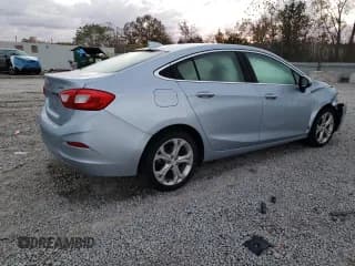 ✅ 2017 Chevrolet Cruze Premier • VIN: 1G1BF5SM6H7179855 • Lot: 86877645. Listed on Copart with 99,204 mi. Free auction sales archive from the USA and detailed vehicle history report at DreamBid. Image 3.