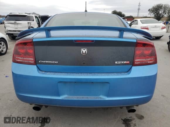 2008 Dodge Charger SRT-8 с VIN 2B3LA73W98H171843, выставлен на аукционе Copart как лот 86603544 с пробегом 61 894 миль миль и Списание • Salvage title. История ставок и продаж доступна на DreamBid. Изображение 6.