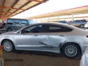 ✅ 2014 Ford Fusion Titanium • VIN: 3FA6P0SU6ER234520 • Лот: 42588028. Опубликован ранее на IAAI с пробегом 98 287 миль. Бесплатный доступ к архиву аукционных продаж из США и подробный отчёт об истории автомобиля на DreamBid. Изображение 14.