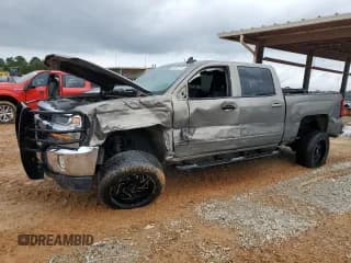 ✅ 2017 Chevrolet Silverado 1500 LT • VIN: 3GCUKREH5HG352285 • Лот: 72920774. Опубликован ранее на Copart с пробегом 169 597 миль. Бесплатный доступ к архиву аукционных продаж из США и подробный отчёт об истории автомобиля на DreamBid. Изображение 1.