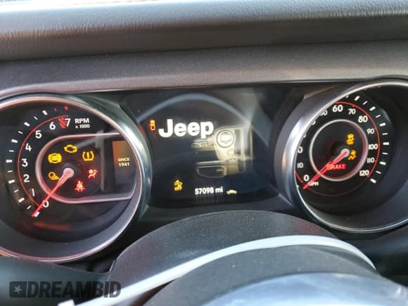 ✅ 2020 Jeep Gladiator Mojave • VIN: 1C6JJTEG1LL209606 • Lot: 88265265. Listed on Copart with 57,098 mi. Free auction sales archive from the USA and detailed vehicle history report at DreamBid. Image 9.