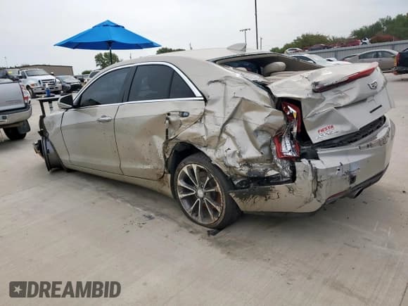 ✅ 2015 Cadillac ATS Luxury AWD • VIN: 1G6AH5SXXF0134675 • Lot: 70814425. Wystawiony na Copart z przebiegiem 101 220 mil. Bezpłatny archiwum sprzedaży aukcyjnych z USA i szczegółowy raport historii pojazdu na DreamBid. Zdjęcie 2.