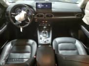 ✅ 2023 Mazda CX-5 S Carbon Edition • VIN: JM3KFBCM2P0122815 • Lot: 92451015. Wystawiony na Copart z przebiegiem 78 565 mil. Bezpłatny archiwum sprzedaży aukcyjnych z USA i szczegółowy raport historii pojazdu na DreamBid. Zdjęcie 8.