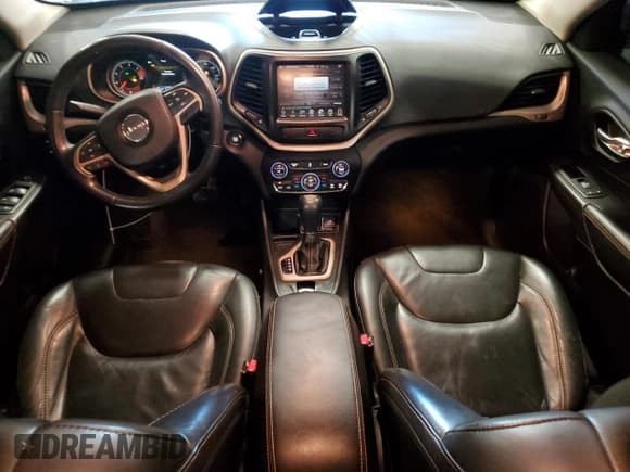 ✅ 2016 Jeep Cherokee Limited • VIN: 1C4PJLDB0GW216303 • Lot: 82265635. Listed on Copart with 131,659 mi. Free auction sales archive from the USA and detailed vehicle history report at DreamBid. Image 8.