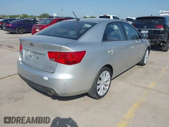 ✅ 2010 Kia Forte SX • VIN: KNAFW4A34A5116442 • Lot: 42202552. Listed on IAAI with 133,303 mi. Free auction sales archive from the USA and detailed vehicle history report at DreamBid. Image 4.