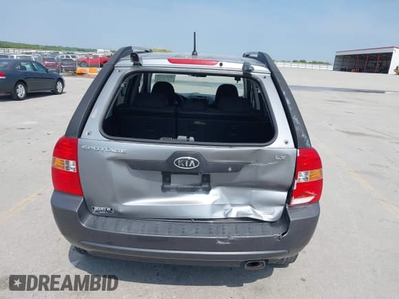 ✅ 2006 Kia Sportage LX • VIN: KNDJF724867286014 • Лот: 42411762. Опубликован ранее на IAAI с пробегом 260 946 миль. Бесплатный доступ к архиву аукционных продаж из США и подробный отчёт об истории автомобиля на DreamBid. Изображение 6.