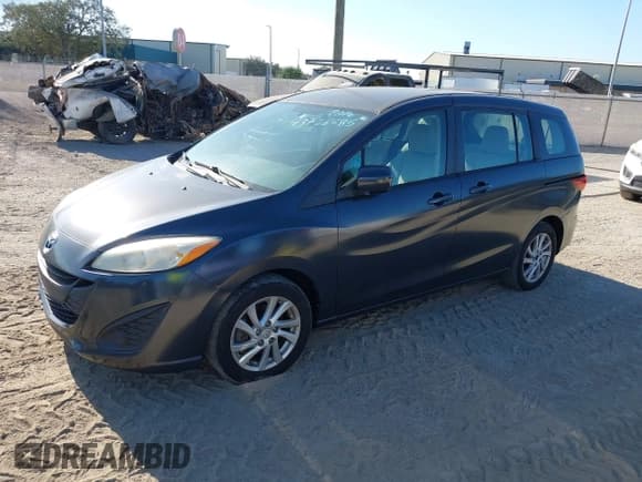 ✅ 2012 Mazda 5 Sport • VIN: JM1CW2BL7C0102981 • Лот: 43726585. Опубликован ранее на IAAI с пробегом 76 920 миль. Бесплатный доступ к архиву аукционных продаж из США и подробный отчёт об истории автомобиля на DreamBid. Изображение 2.