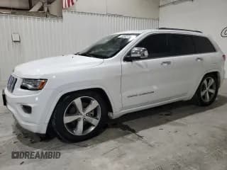 ✅ 2014 Jeep Grand Cherokee Overland • VIN: 1C4RJFCT8EC465449 • Лот: 87425495. Опубликован ранее на Copart с пробегом 104 113 миль. Бесплатный доступ к архиву аукционных продаж из США и подробный отчёт об истории автомобиля на DreamBid. Изображение 1.