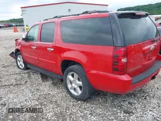 2009 Chevrolet Suburban 2LT z VIN 1GNFK26399R186073, wystawiony jako IAAI lot #42273137 z przebiegiem 175 597 mil mil oraz . Historia ofert i sprzedaży dostępna na DreamBid. Obrazek 3.