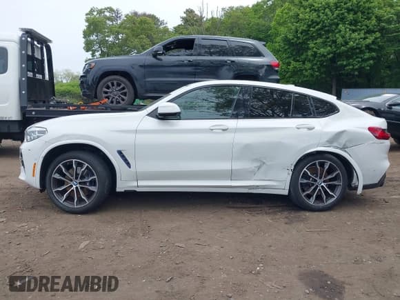 ✅ 2021 BMW X4 M40i • VIN: 5UX2V5C05M9H42920 • Лот: 42361252. Опубликован ранее на IAAI с пробегом 25 855 миль. Бесплатный доступ к архиву аукционных продаж из США и подробный отчёт об истории автомобиля на DreamBid. Изображение 14.