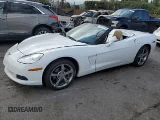 2009 Chevrolet Corvette with VIN 1G1YY36W295105043, listed as a Copart auction lot 50271875 with 8,865 mi miles and Salvage title. Bid and sale history available at DreamBid. Image 1.