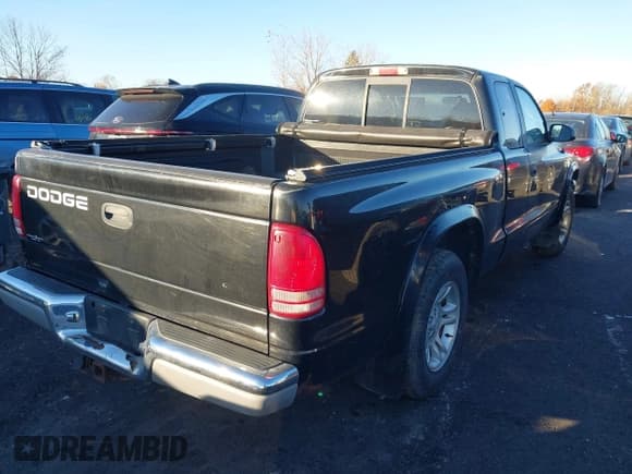 ✅ 2002 Dodge Dakota SLT • VIN: 1B7GL42N02S505517 • Lot: 43614055. Listed on IAAI with 94,752 mi. Free auction sales archive from the USA and detailed vehicle history report at DreamBid. Image 4.