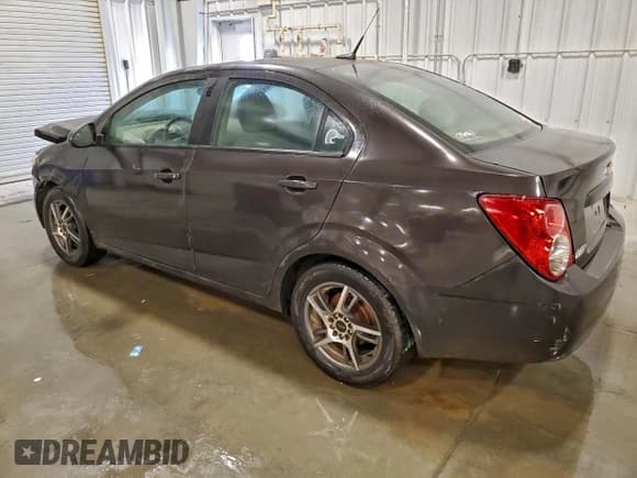✅ 2013 Chevrolet Sonic LS • VIN: 1G1JB5SH7D4238482 • Lot: 94152265. Listed on Copart with 223,646 mi. Free auction sales archive from the USA and detailed vehicle history report at DreamBid. Image 2.