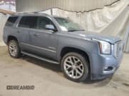 ✅ 2015 GMC Yukon Denali • VIN: 1GKS1CKJ5FR647130 • Lot: 81473705. Listed on Copart with 144,782 mi. Free auction sales archive from the USA and detailed vehicle history report at DreamBid. Image 4.