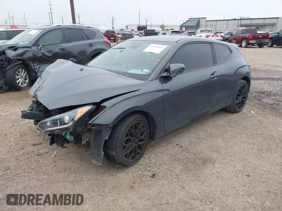 2019 Hyundai Veloster Premium with VIN KMHTG6AF0KU006614, listed as a IAAI auction lot 41329224 with 65,841 mi miles and . Bid and sale history available at DreamBid. Image 2.