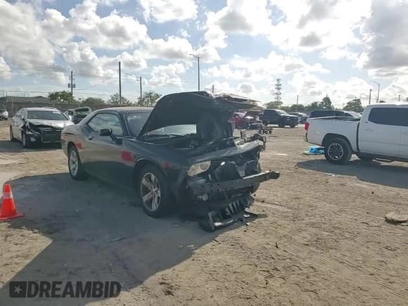 ✅ 2014 Dodge Challenger SXT • VIN: 2C3CDYAG6EH184864 • Лот: 85660624. Опубликован ранее на Copart с пробегом 105 204 миль. Бесплатный доступ к архиву аукционных продаж из США и подробный отчёт об истории автомобиля на DreamBid. Изображение 10.