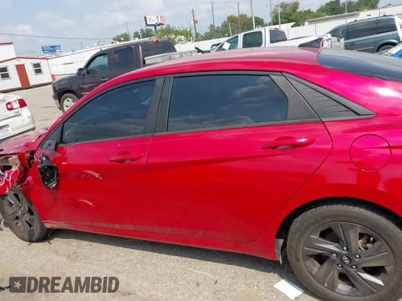 ✅ 2021 Hyundai Elantra SEL • VIN: 5NPLS4AG4MH008962 • Lot: 43253230. Listed on IAAI with 68,599 mi. Free auction sales archive from the USA and detailed vehicle history report at DreamBid. Image 14.
