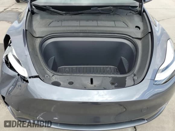 ✅ 2022 Tesla Model Y Long Range • VIN: 7SAYGDEE2NF443711 • Lot: 50913815. Wystawiony na Copart z przebiegiem 19 700 mil. Bezpłatny archiwum sprzedaży aukcyjnych z USA i szczegółowy raport historii pojazdu na DreamBid. Zdjęcie 12.