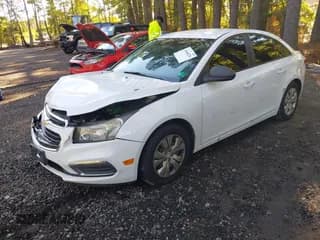 ✅ 2016 Chevrolet Cruze LS • VIN: 1G1PC5SH2G7203083 • Lot: 43464226. Listed on IAAI with 261,185 mi. Free auction sales archive from the USA and detailed vehicle history report at DreamBid. Image 2.