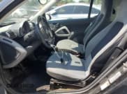 ✅ 2009 Smart fortwo Pure • VIN: WMEEJ31X69K312553 • Лот: 57811135. Опубликован ранее на Copart с пробегом 156 487 миль. Бесплатный доступ к архиву аукционных продаж из США и подробный отчёт об истории автомобиля на DreamBid. Изображение 7.