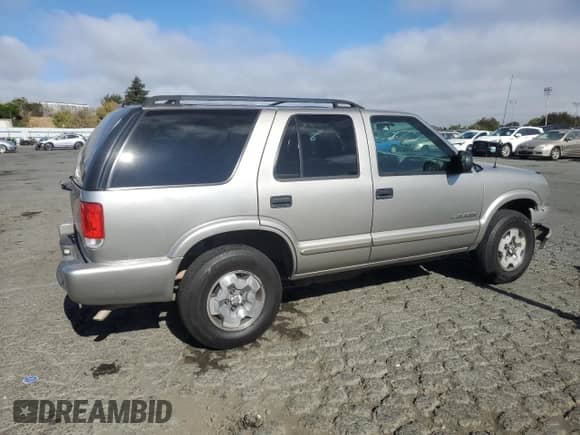 2004 Chevrolet Blazer LS z VIN 1GNDT13X44K138164, wystawiony jako Copart lot #75337094 z przebiegiem Nie podano mil oraz Czysty tytuł • Clean title. Historia ofert i sprzedaży dostępna na DreamBid. Obrazek 3.