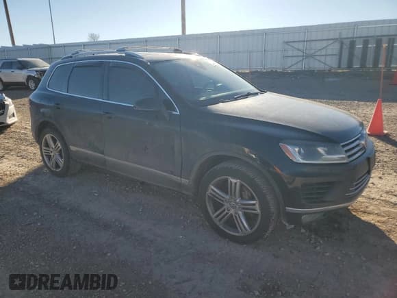 ✅ 2015 Volkswagen Touareg Executive • VIN: WVGEP9BP9FD002889 • Лот: 83443004. Опубликован ранее на Copart с пробегом 174 879 миль. Бесплатный доступ к архиву аукционных продаж из США и подробный отчёт об истории автомобиля на DreamBid. Изображение 4.