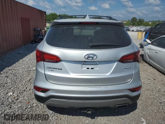 ✅ 2018 Hyundai Santa Fe 2.4L • VIN: 5XYZU3LB2JG561483 • Лот: 60343064. Опубликован ранее на Copart с пробегом 128 845 миль. Бесплатный доступ к архиву аукционных продаж из США и подробный отчёт об истории автомобиля на DreamBid. Изображение 6.