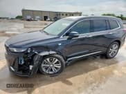 ✅ 2021 Cadillac XT6 Premium Luxury • VIN: 1GYKPCRS7MZ216563 • Lot: 64617015. Listed on Copart with 44,975 mi. Free auction sales archive from the USA and detailed vehicle history report at DreamBid. Image 1.