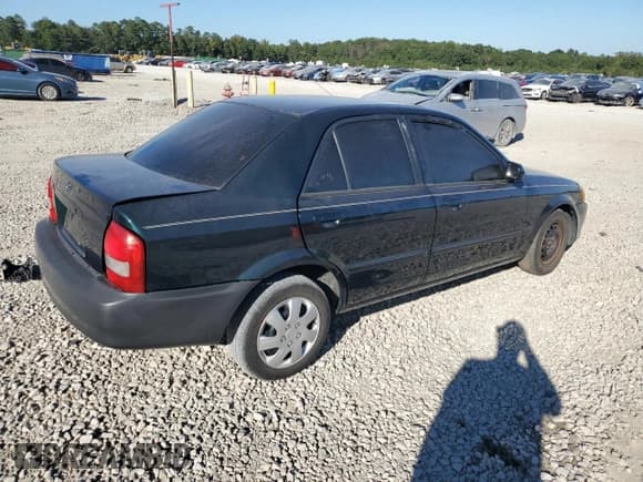 ✅ 1999 Mazda Protege DX • VIN: JM1BJ2222X0126273 • Lot: 75479364. Wystawiony na Copart z przebiegiem 293 952 mil. Bezpłatny archiwum sprzedaży aukcyjnych z USA i szczegółowy raport historii pojazdu na DreamBid. Zdjęcie 3.