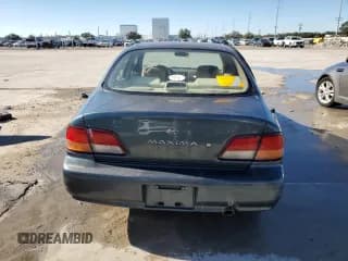 ✅ 1998 Nissan Maxima GXE • VIN: JN1CA21D0WT607873 • Lot: 80856484. Listed on Copart with 198,057 mi. Free auction sales archive from the USA and detailed vehicle history report at DreamBid. Image 6.