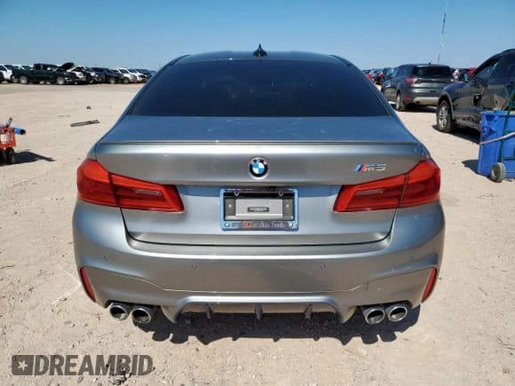 ✅ 2018 BMW M5 • VIN: WBSJF0C55JB282449 • Lot: 60221525. Listed on Copart with 22,112 mi. Free auction sales archive from the USA and detailed vehicle history report at DreamBid. Image 6.