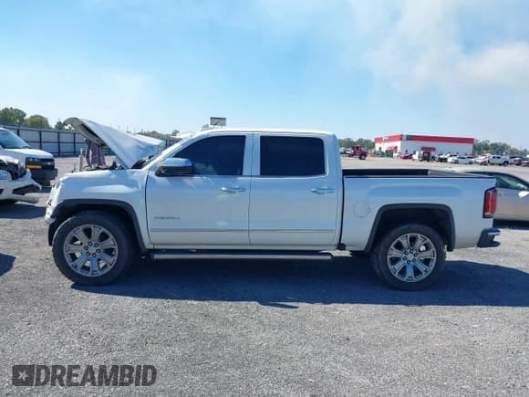 ✅ 2017 GMC Sierra 1500 Denali • VIN: 3GTU2PEJ0HG147836 • Lot: 43410221. Listed on IAAI with 98,619 mi. Free auction sales archive from the USA and detailed vehicle history report at DreamBid. Image 14.