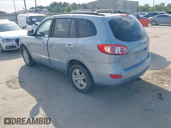 ✅ 2010 Hyundai Santa Fe GLS • VIN: 5NMSG3AB8AH387615 • Лот: 43344282. Опубликован ранее на IAAI с пробегом 231 164 миль. Бесплатный доступ к архиву аукционных продаж из США и подробный отчёт об истории автомобиля на DreamBid. Изображение 3.