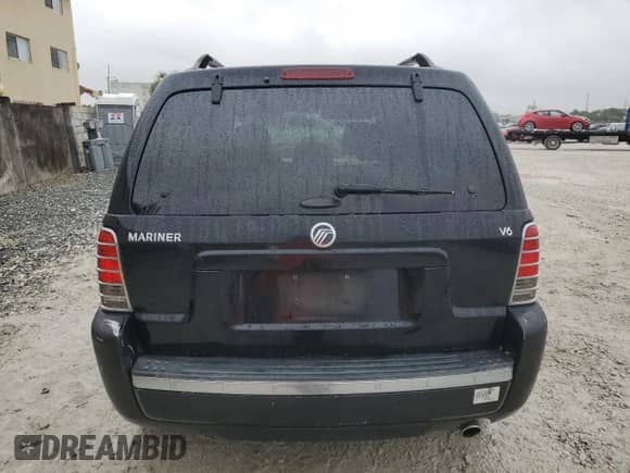 2006 Mercury Mariner Luxury с VIN 4M2YU561X6KJ11487, выставлен на аукционе Copart как лот 42571955 с пробегом 184 935 миль миль и Списание • Salvage title. История ставок и продаж доступна на DreamBid. Изображение 6.