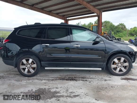 ✅ 2016 Chevrolet Traverse LTZ • VIN: 1GNKRJKD7GJ222339 • Lot: 42415735. Wystawiony na IAAI z przebiegiem 130 183 mil. Bezpłatny archiwum sprzedaży aukcyjnych z USA i szczegółowy raport historii pojazdu na DreamBid. Zdjęcie 14.