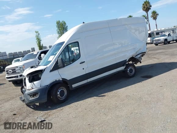✅ 2021 Ford Transit Cargo • VIN: 1FTBR3X85MKA03949 • Lot: 43112009. Listed on IAAI with 113,531 mi. Free auction sales archive from the USA and detailed vehicle history report at DreamBid. Image 2.
