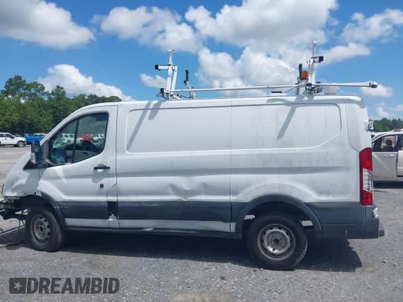 ✅ 2016 Ford Transit Cargo • VIN: 1FTYR1YM4GKB55185 • Lot: 42769357. Listed on IAAI with Not provided. Free auction sales archive from the USA and detailed vehicle history report at DreamBid. Image 14.